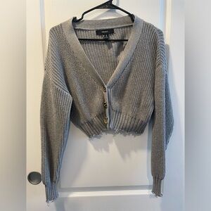 Raw edge cropped sweater